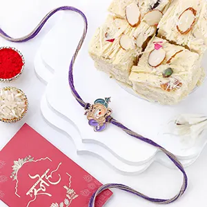 Bal Ganesha Cheerful Charm Rakhi N Soan Papdi