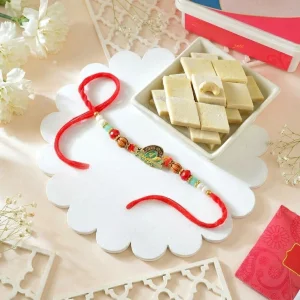 Krishna Bansuri Rakhi Gift Combo with Kaju Katli