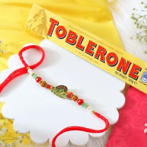 Krishna Bansuri Rakhi Gift Combo with Toblerone Chocolate