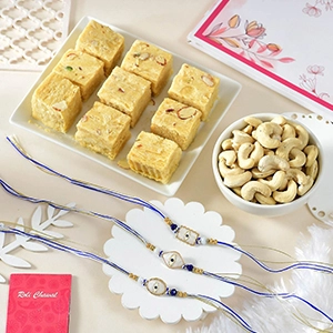 Elegant Evil Eye Rakhi Set with Soan Papdi & Cashew