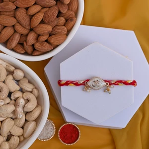 Pearl Om Rakhi with Premium Cashews & Almonds