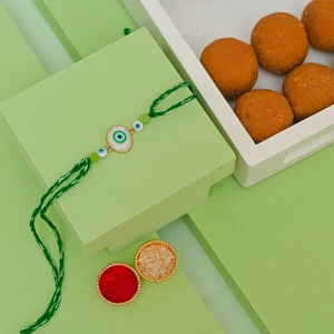 Sacred Nazar Rakhi with Besan Laddu