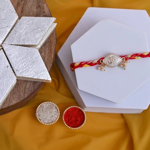 Pearl Om Rakhi with Premium Kaju Katli