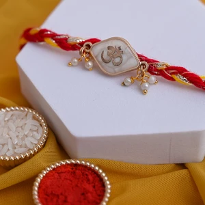 Elegant Pearl Om Rakhi for Raksha Bandhan