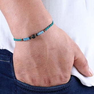 Lava Stone Rakhi in Blue Thread
