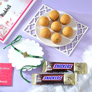 Alluring Single Rakhi with Besan Laddoo & Chocolates