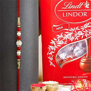 Luminescent Luster Pearl Rakhi & Lindt