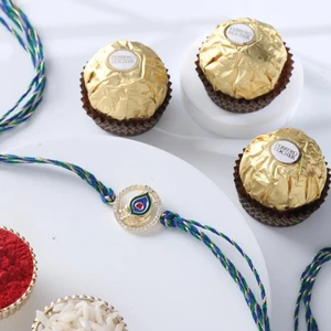 FNP Peacock Rakhi With Ferrero Rocher 3 Pcs