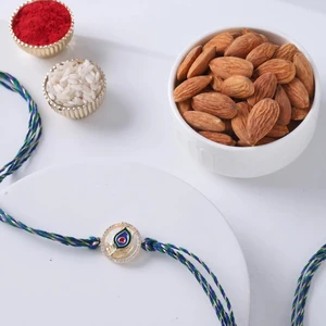FNP Peacock Rakhi With Almond 200 g