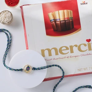 FNP Peacock Rakhi With Merci Chocolate