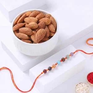 FNP Chakra Stone Rakhi With Almonds 200 g