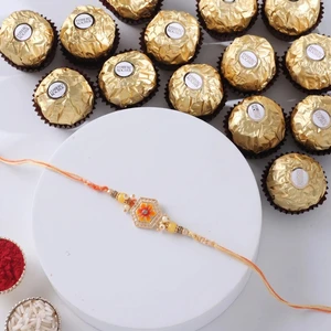 FNP Orange Designer Rakhi With Ferrero Rocher 16 Pcs
