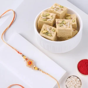 FNP Orange Designer Rakhi With Soan Papdi 250 g