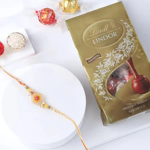 FNP Orange Designer Rakhi With Chocolate Truffles