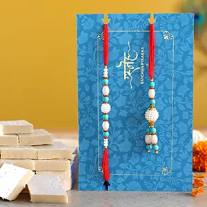 Blue Pearl And Lumba Rakhi Set With 340 Gms Kaju Katli - For Qatar