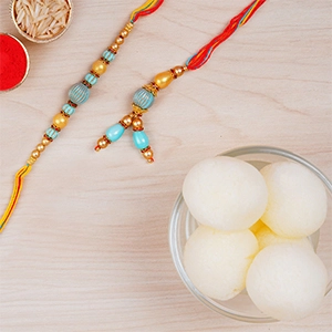 Blue Stone Rakhi Set And Haldiram Rasgulla Tin Combo