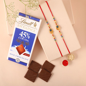 Sneh Peacock Feather Rakhi & Lindt Bar
