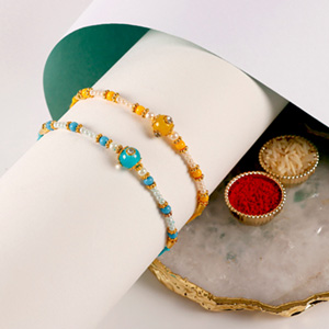 Sneh Vibrant Set Of 2 Pearl Rakhis - Rakhi to Qatar