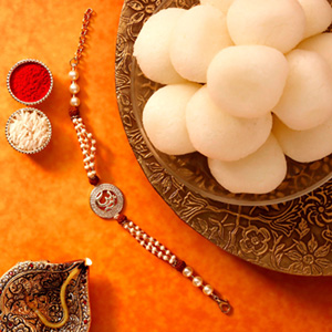Sneh Holy Om Rakhi & Rasgullas - Rakhi to Qatar