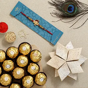 Ganesha Kids Rakhi With Kaju Katli And Ferrero Rocher - For Qatar