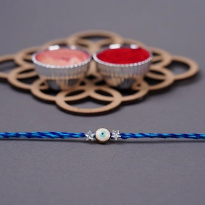 Dual Blue Evil Eye Rakhi with Roli Chawal