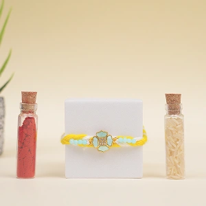 Elegant Yellow Thread Floral Design Rakhi with Roli Chawal