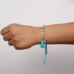 Elegant Blue Lumba Rakhi with Roli Chawal