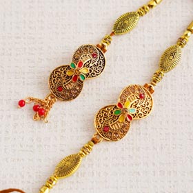Enticing Golden Bhaiya Bhabhi Rakhi Set
