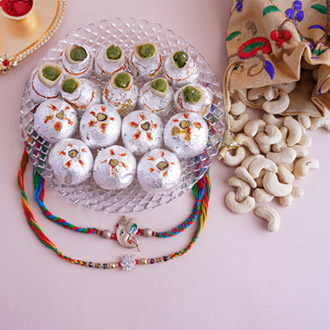 Designer Rakhis with Luscious Sweets Hamper