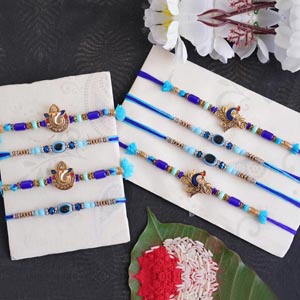Set of 2 Ganesha Rakhi, 2 Peacock Rakhi and 4 Evil Eye Rakhi