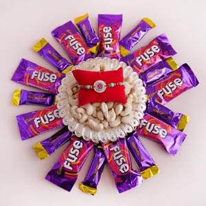 Om Rakhi Combo with Cashews Tray and Chocolates