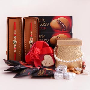 Two Designer Rakhis with Almonds and Chocolates