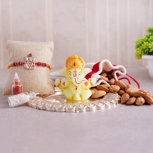 Ganesha Rakhi With Almonds and Puja Thali Combo