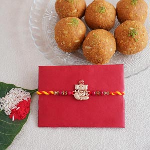 Silver Ganesha Rakhi with Besan Laddoo
