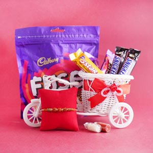 Rudraksha Rakhi with Chocolates and Toy Cycle