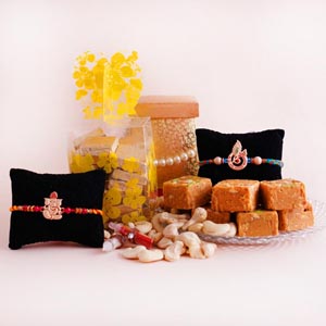Auspicious Rakhi with  Dryfruits and Sweets Hamper
