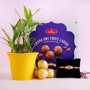Om Rakhi with Lucky Bamboo and Chana Laddoo