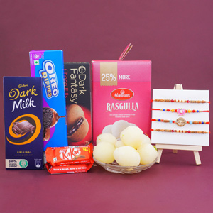 Set of Four Rakhis with Chocolates N Sweets Gift Pack