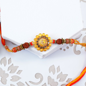 Auspicious Golden Om Rakhi - Rakhi Worldwide