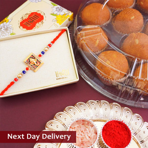 Auspicious Golden Ganpati Rakhi with Sweets Next Day Delivery