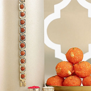 Glamorous Gold Embellished Rudraksh Rakhi N Ladoo Combo