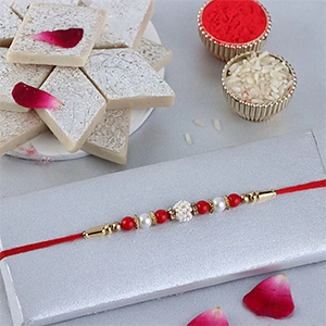 Sneh Nityam Creation Regular Ethnic Pearl Rakhi with Kaju Katli