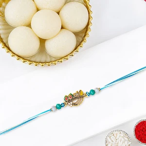 Divine Krishna Flute Rakhi with Rasgulla