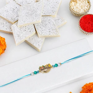 Divine Krishna Flute Rakhi with Kaju Katli