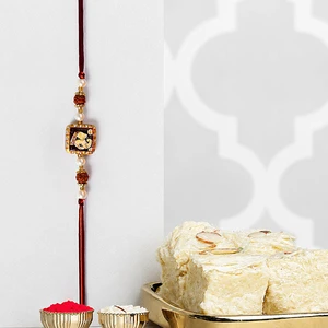 Divine Ganesha Rudraksha Pearl Rakhi with Soan Papdi