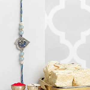 Blue Serenity Om Rakhi with Soan Papdi