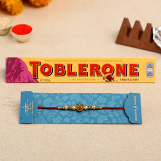 Lion Face Pearl Rakhi And Toblerone Chocolate