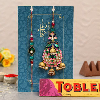 Pink Peacock Lumba Rakhi Set With Toblerone Chocolate