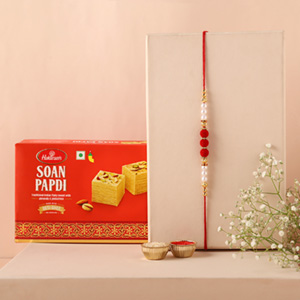 Sneh Red White Pearl Rakhi & Soan Papdi