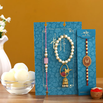 Caged Bird Lumba Rakhi Set & Om Rakhi With Rasgulla